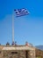 Greece flag at the Parthenon temple at the Acropoli