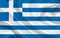 Greece flag on wavy silk fabric background panorama