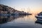 Greece, island of Symi, old harbor at dawn, Dodecanese, Aegean sea.