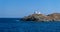 Greece, Kea Tzia island. Seascape with lighthouse, clear blue sky