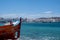 Greece, Mikonos island, Cyclades. Mykonos port, sea, beach, building, shop, blue sky background
