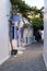 Greece, Milos island. Souvenir shop bougainvillea alley at Chora town Plaka Melos Cyclades