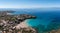 Greece Peloponnese. Stoupa seaside village and sandy beach, aerial view. Mani, Messenia