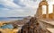 Greece. Rhodes. Acropolis of Lindos. Doric columns of ancient Temple of Athena Lindia the IV century BC and the bay of