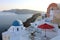 Greece Santorini island in Cyclades. Panoramic view of Caldera sea with ship in background