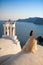 Greece, Santorini, Oia. September 16, 2014: a couple of newly married people in beautiful attire enjoying their honeymoon months