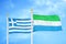 Greece and Sierra Leone two flags on flagpoles and blue sky