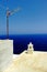 Greece, Sifnos island, antenna next to a traditional chimney on roof