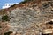 Greece, Sifnos island, view of traditional cubic house built on a cliff`s edge in Kastro village.