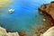 Greece summer coastline view. Blue sea water, mountain and boat