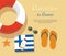 Greece Tourism. Flip- flops in the sand with towel, sun glasses and others