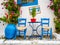 Greece: Typical Greek Blue Chairs and Table in a small Cafeteria