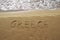 Greece written in sand