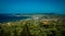 Greece, Zakynthos, August 2016. Rocks, caves and blue water. View from observation point to panorama of island, bay and road