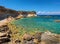 Greece Zakynthos wild beach for lovers, stone rocks, blue water of Ionian Sea, reefs, near to Blue Caves. Best Greece holidays vac