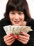 Greedy woman holding money