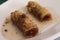 Greek baklava rolls on a plate