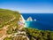 Greek biggest national flag waving in the sky in Keri in Zakynthos (Zante) island in Greece