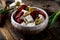 Greek cheese feta with herbs and olives, sundried tomatoes. Bulgarian cheese. Feta in oil. Olove oil. selective focus