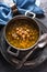 Greek chickpea soup on the stone background top view