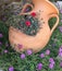 Greek clay amphora with flowers