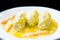 Greek cuisine: Stuffed zuchinni with avgolemono