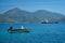 Greek fishing speed boat and cargo ship in the Aegean sea, Greece