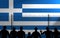 Greek Flag Behind Secure Fence