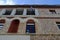 Greek Flag Hanging From Old Civic Building