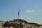 Greek Flag Near One Of The Lookouts In The Acropolis Of Athens. In The Acroplis Of Athens. History, Architecture, Travel, Archeolo