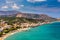 Greek holidays, beautiful Kalyves village with turquoise sea in Crete island, Greece. View of Kalyves beach, Crete. Tourists