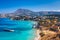 Greek holidays, beautiful Kalyves village with turquoise sea in Crete island, Greece. View of Kalyves beach, Crete. Tourists