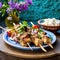 Greek lamb souvlaki skewers with salad.