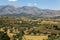 Greek landscape with meadow, mountain and blue sky, demeter temp