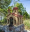 Greek miniature church reminiscent of a church for lighting candles