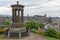 Greek monument at Calton Hill with view at Scotish Edinburgh