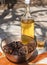 Greek national Easter dish Kokoretsi and a bottle with a glass of white wine stands on a marble table in a village in Greece