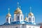greek orthodox church with blue domes