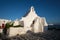 Greek Orthodox Church of Panagia Paraportiani in town of Chora on Mykonos island