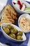 Greek platter with olives vegetables and toast