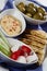 Greek platter with olives vegetables and toast