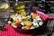 Greek potatoes skillet with feta cheese, olives and pepper