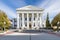 greek revival courthouse with twin pillars