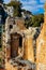 Greek and Roman Teatro antico Ancient Theatre with stage and arches colonnade ruins in Taormina of Sicily in Italy