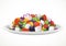 Greek salad of fresh vegetables and cheese in large white ceramic plate object