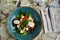 Greek salad with giant olives and provencal herbs