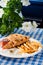 Greek souvlaki with pita bread and vegetables close-up on the table