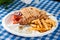 Greek souvlaki with pita bread and vegetables close-up on the table