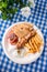 Greek souvlaki with pita bread and vegetables close-up on the table