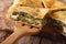 Greek spanakopita piece of pie macro. horizontal